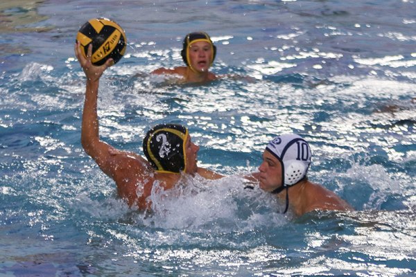 Cameron Olson, shown here in an earlier match, scored three goals in the crucial final period as the Tigers defeated Kingsburg to advance in the Central Section playoffs. They lost to Garces High in the semi-finals.